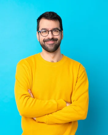 20230416000517_fpdl.in_young-caucasian-man-isolated-blue-wall-with-glasses-happy_1368-76399